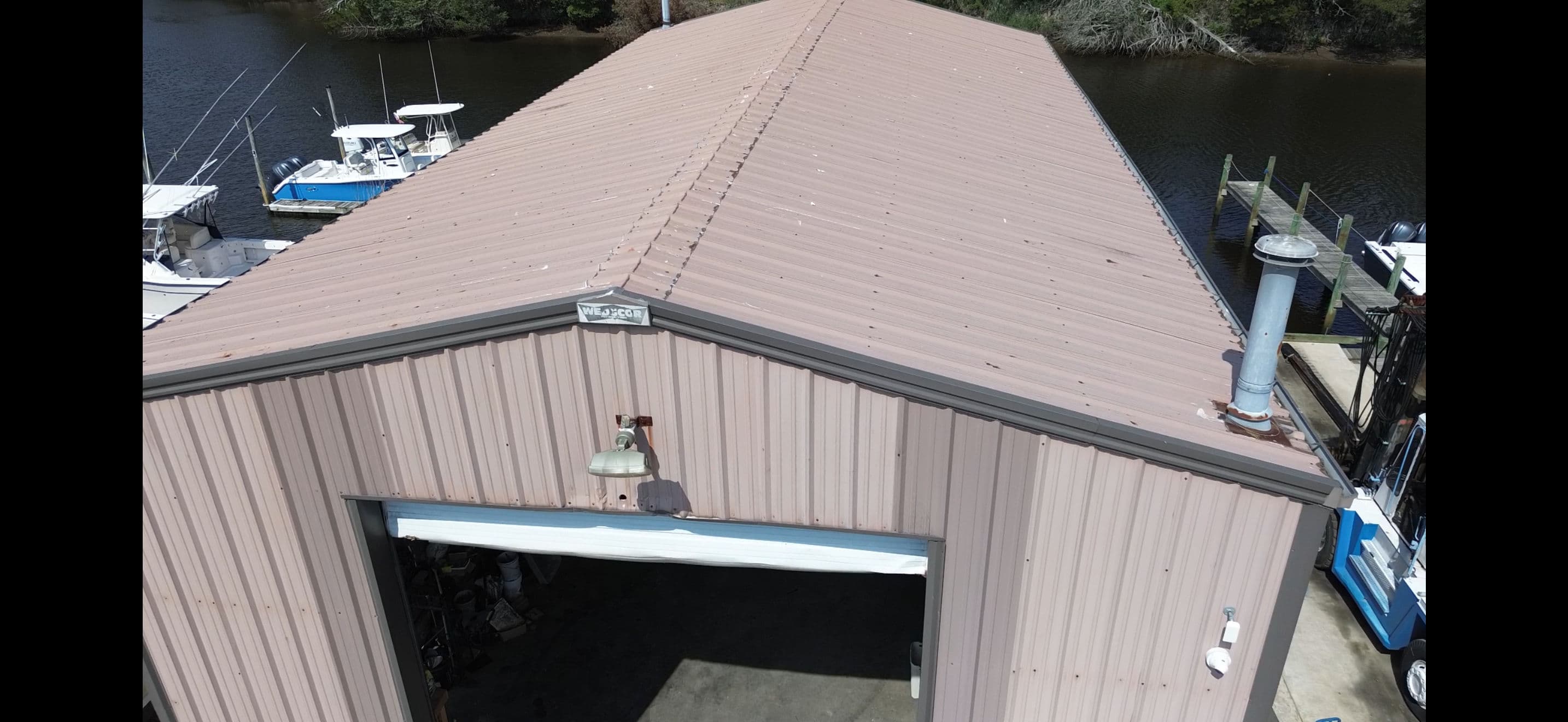 Project Commercial Metal Roof Repair and Silicone Coating That Stopped the Leaks image